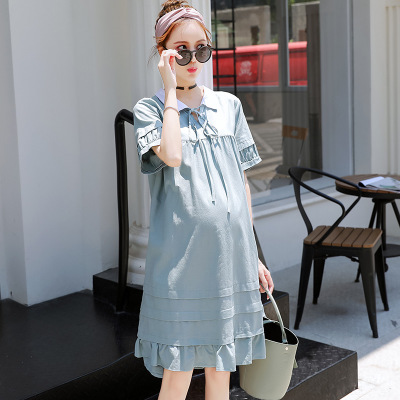 The Korean version of The maternity cotton and linen dress, a new summer product, is The b-8060 maternity dress with a long lapel in a solid color